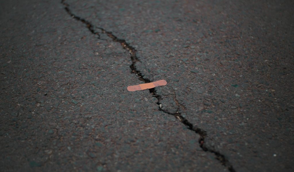 bandaid on concrete crack