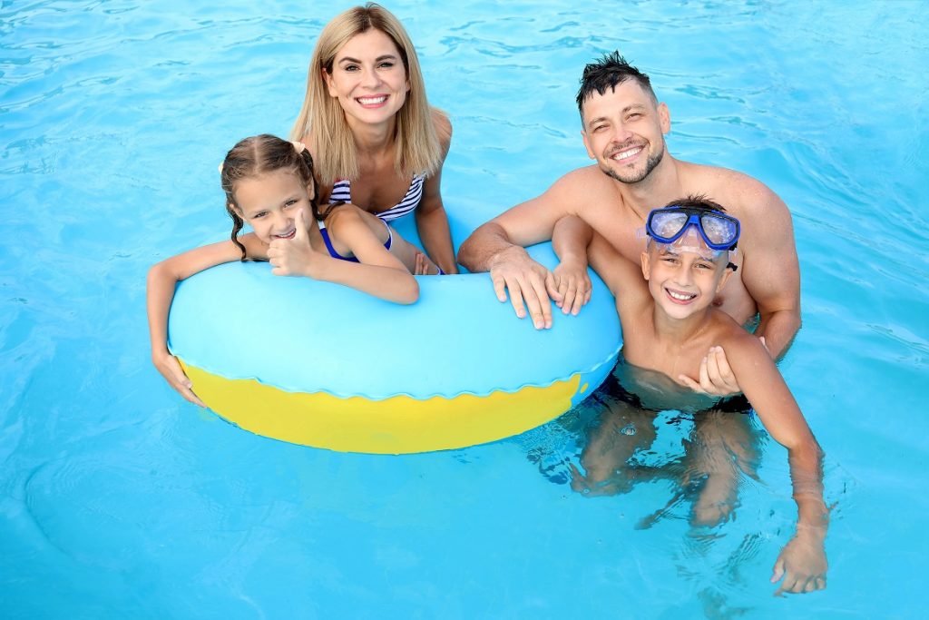 family in pool