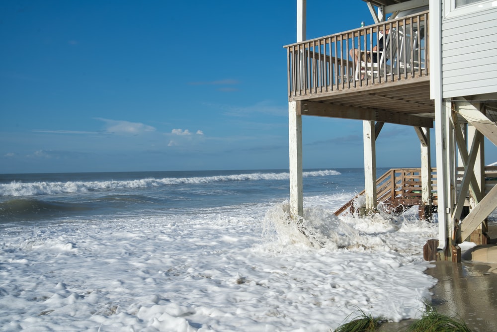 ocean waves hitting house deck