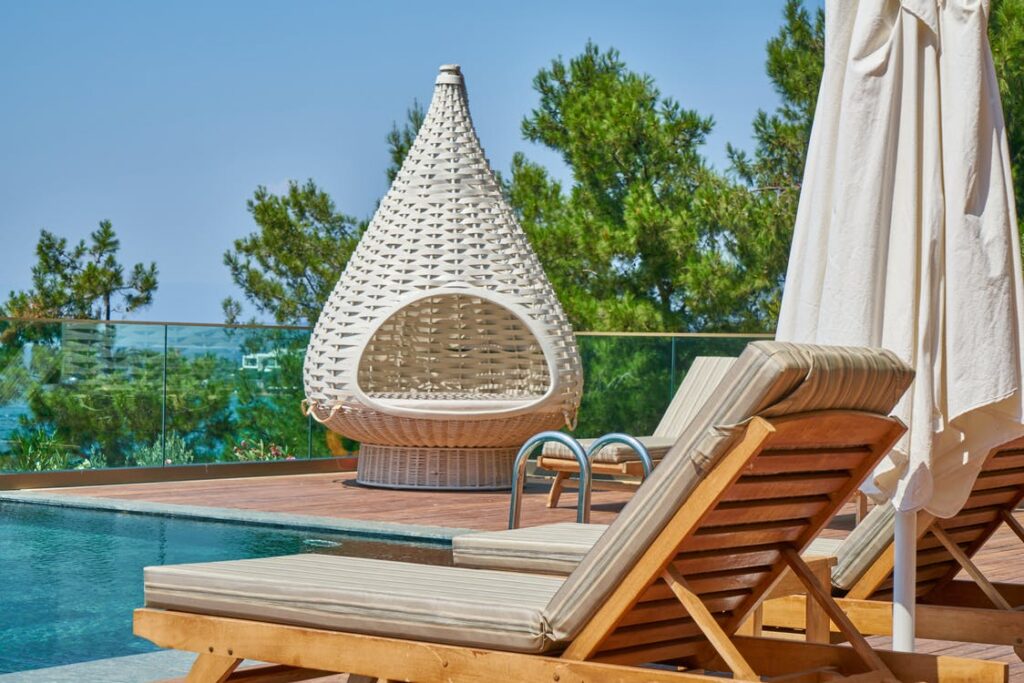luxury hotel pool and lounge chairs