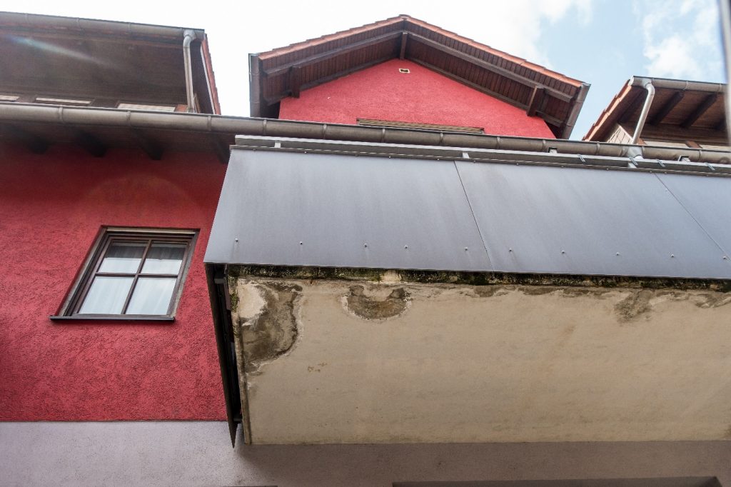 water damage underneath balcony