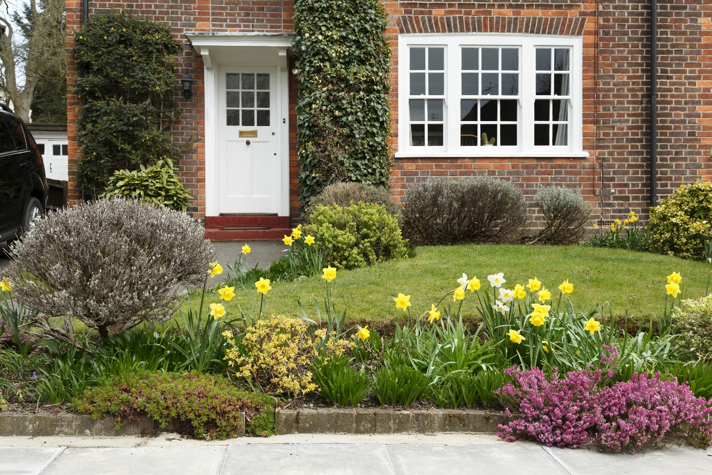 brick house with front garden