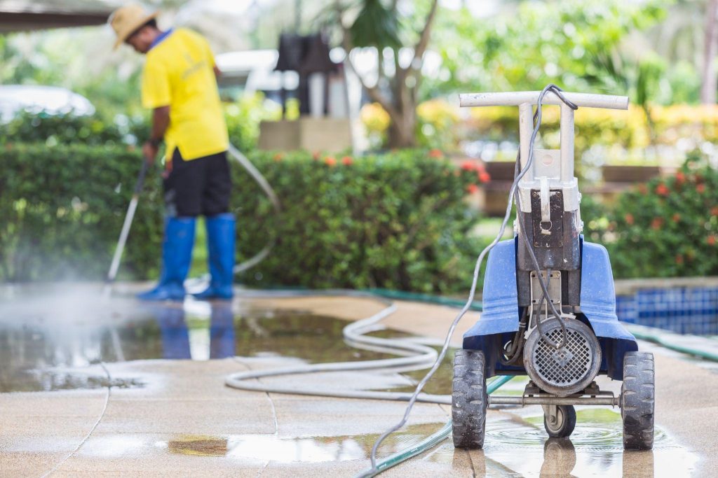 Close up Outdoor floor cleaning with high pressure water jet